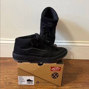 Vans Black Mid-Top Sneakers